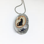Load image into Gallery viewer, black cat locket open
