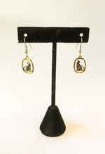 Load image into Gallery viewer, Silver and gold cat earrings facing out hanging
